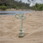 Peg secured in soft sandy soil